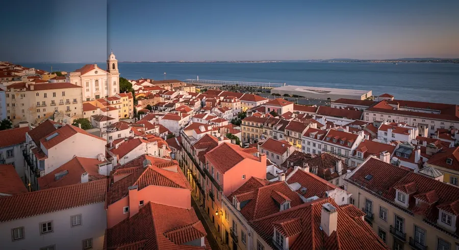 Lisbon Alfama rooftops at golden hour